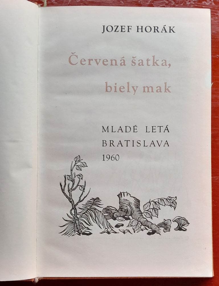 Červená šatka, biely mak